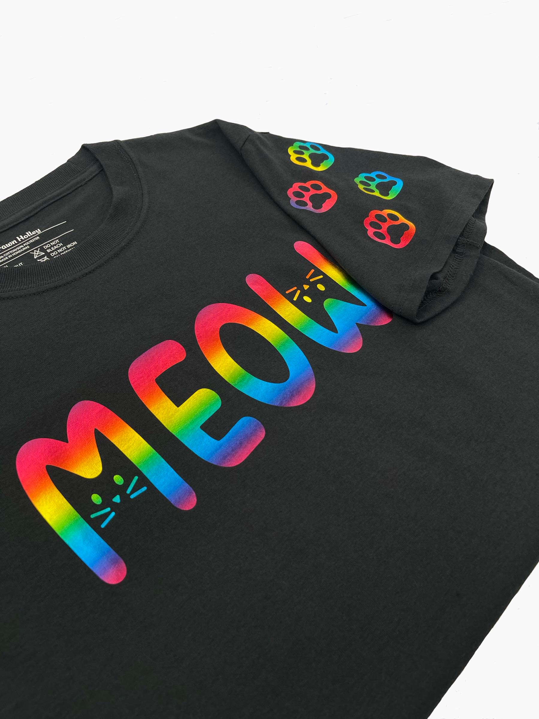 Close up of left sleeve with rainbow metallic cat paws and Meow on front.